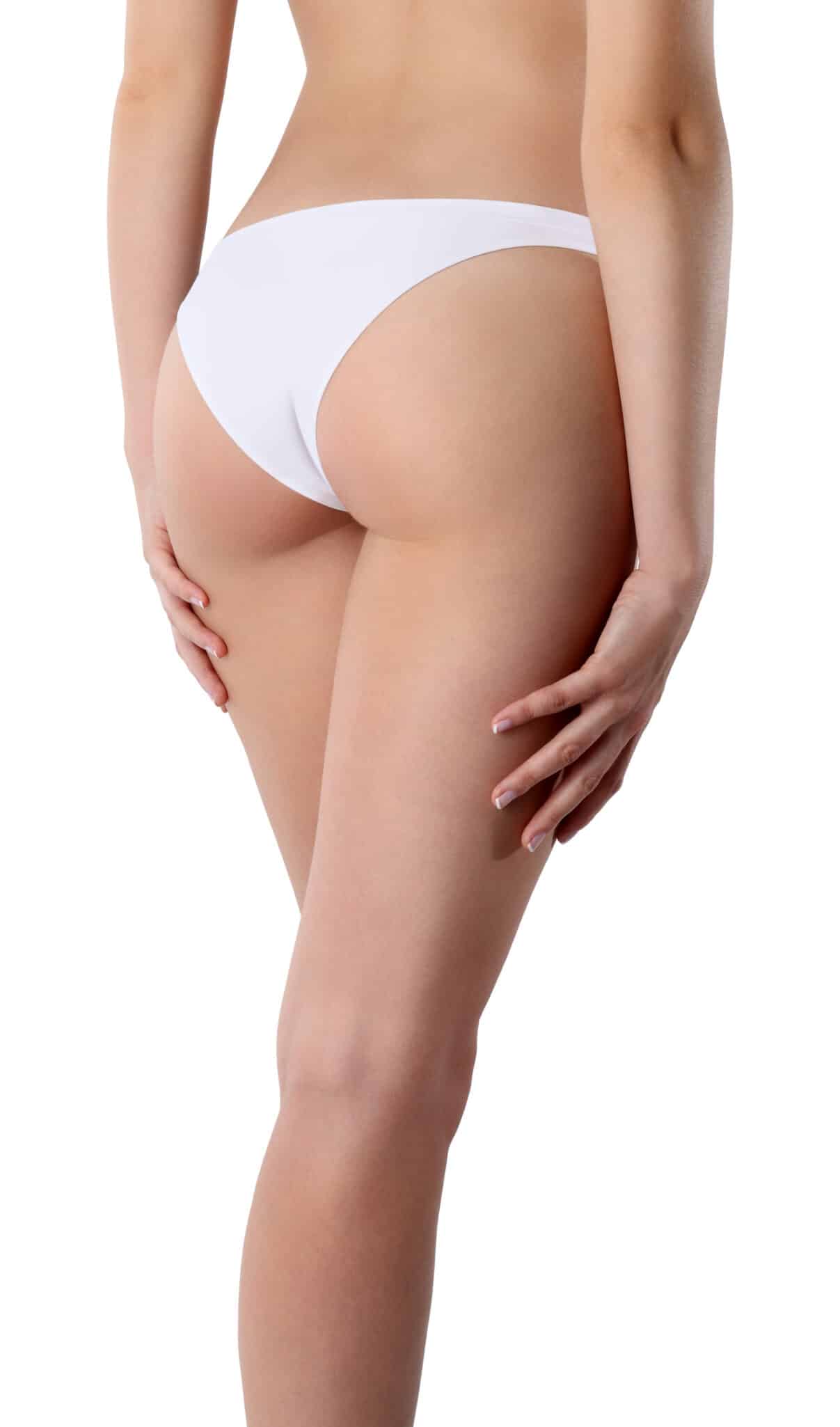 An image of a slim womans butt and legs on a white background